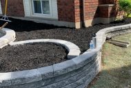 landscaping-flower-bed-install-retaining-wall